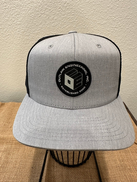 GREY & BLACK TRUCKER - OUTLAW LOGO PATCH HAT